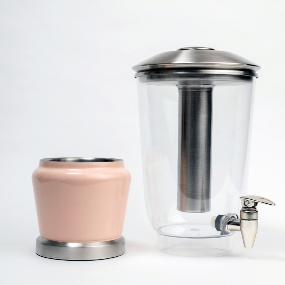 Blush Rose Luminique dispenser in Powder Pink in stainless steel and BPA free acrylic, with top and bottom seperable for easy cleaning