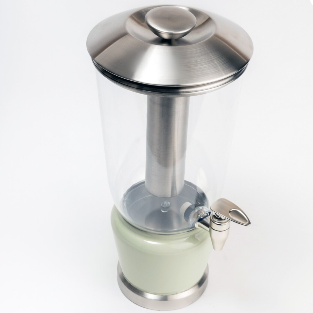 Mellow Sage Luminique dispenser in subtle mint green in stainless steel and BPA free acrylic, with a high quality spigot tap