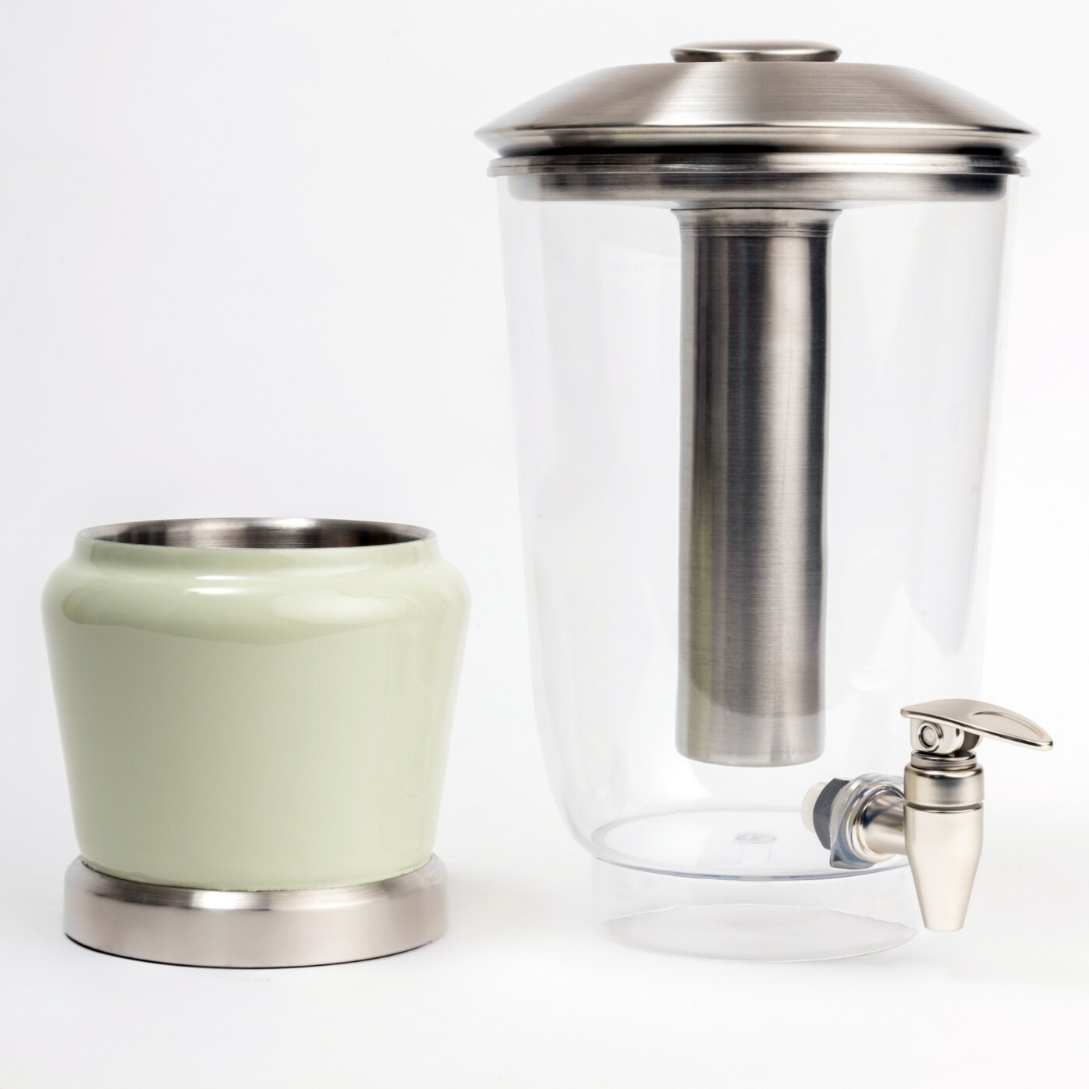 Mellow Sage Luminique dispenser in subtle mint green in stainless steel and BPA free acrylic, with seperable top and bottom for easy access and cleaning