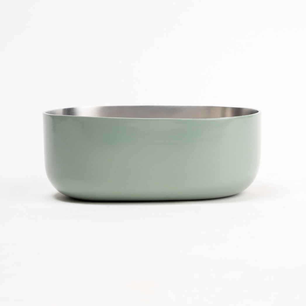Side view of a stainless steel Celestique Bowl in mellow sage green