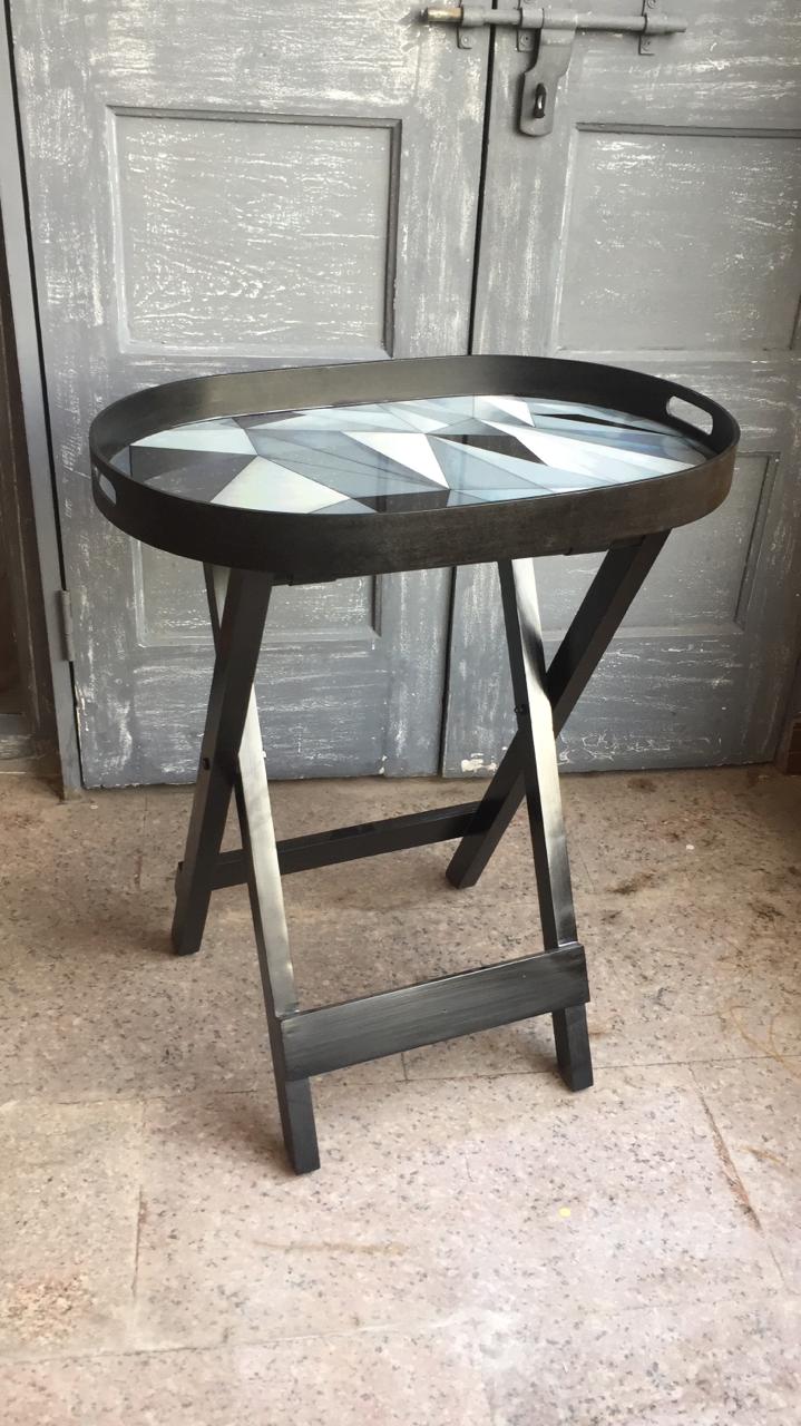 Facets Black Oval Butler Wooden Table For brighten any room
