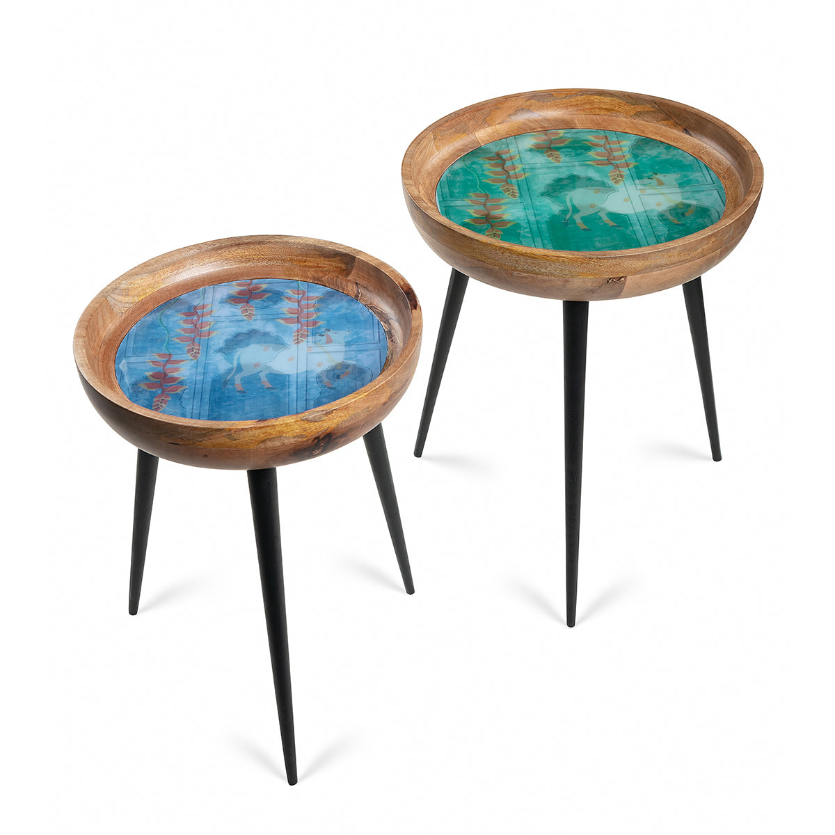 Two wooden peg tables in large (green) & small (blue) featuring nandi cow with pichwai artwork